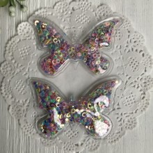 Силиконовая бабочка с наполнителем, 7х4,5 см, разноцветные колечки, упаковка 20 шт. Силиконовая бабочка с наполнителем, 7х4,5 см, разноцветные колечки, упаковка 20 шт.