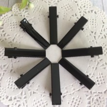 Крокодил черный (метал), 3,2 см, упаковка 500 шт.