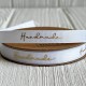 Репс з золотим надписом Handmade, 1 см, білий, рулон 23 м
