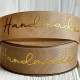 Репс c золотой надписью Handmade, 2,5 см, бежевый, рулон 23 м