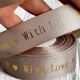 Репс "With love", 2,5 см, бежево-сірий, рулон 18 м Репс "With love", 2,5 см, бежево-сірий, рулон 18 м
