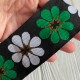Тесьма вышиванка (ромашка), 5 см, черная с белым и зеленым, рулон 7 м