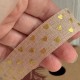 Стрічка мішковина з золотим сердечком, 2,5 см, бежева, рулон 9 м Стрічка мішковина з золотим сердечком, 2,5 см, бежева, рулон 9 м