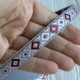 Жакард-вышиванка (ТВ-№12), 1,2 см, серый, рулон 45 м Жакард-вышиванка (ТВ-№12), 1,2 см, серый, рулон 45 м