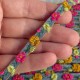 Жакардовая тесьма цветочек, 0,9 см, серая с малиново-салатовым цветочком, рулон 20 м
